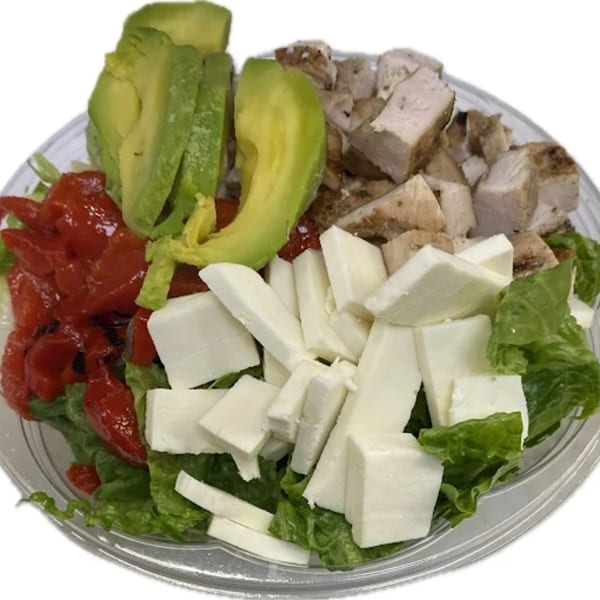 Grace Deli salad with grilled chicken, avocado, roasted red peppers, and feta cheese.