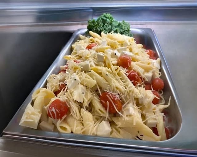 Penne Pasta with Fresh Motz, Parmesan and Tomato.