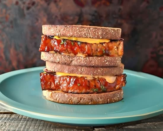 Meatloaf Melt Supreme on Toasted Bread.