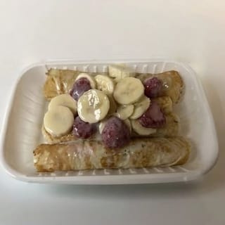 Strawberry Banana Topped Stuffed Crêpes