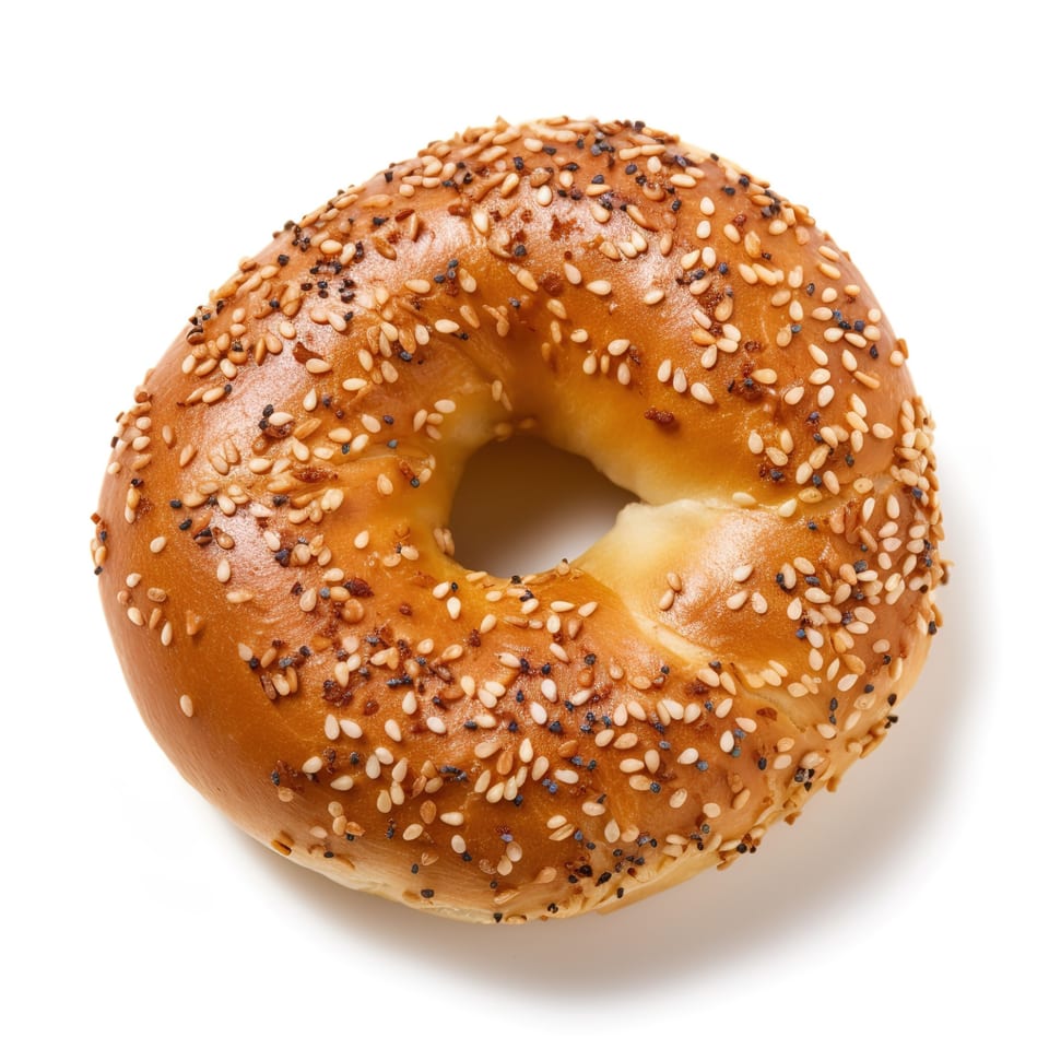 Grace Deli's everything bagel, topped with sesame seeds and poppy seeds, on a white background.