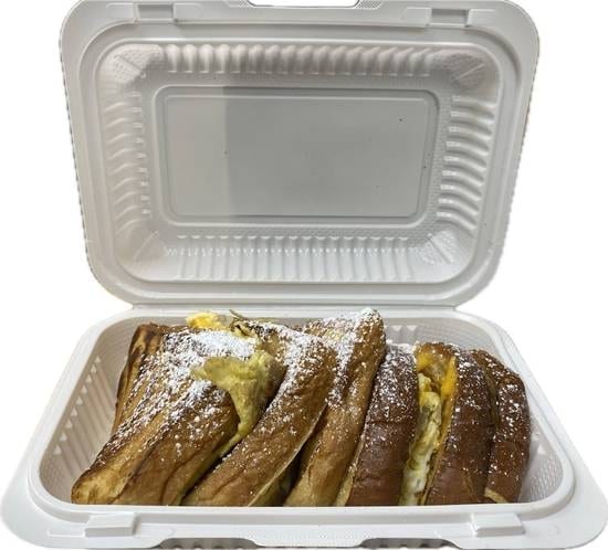 French Toast Holy Cow Stuffed with Sausage Eggs and Cheese.